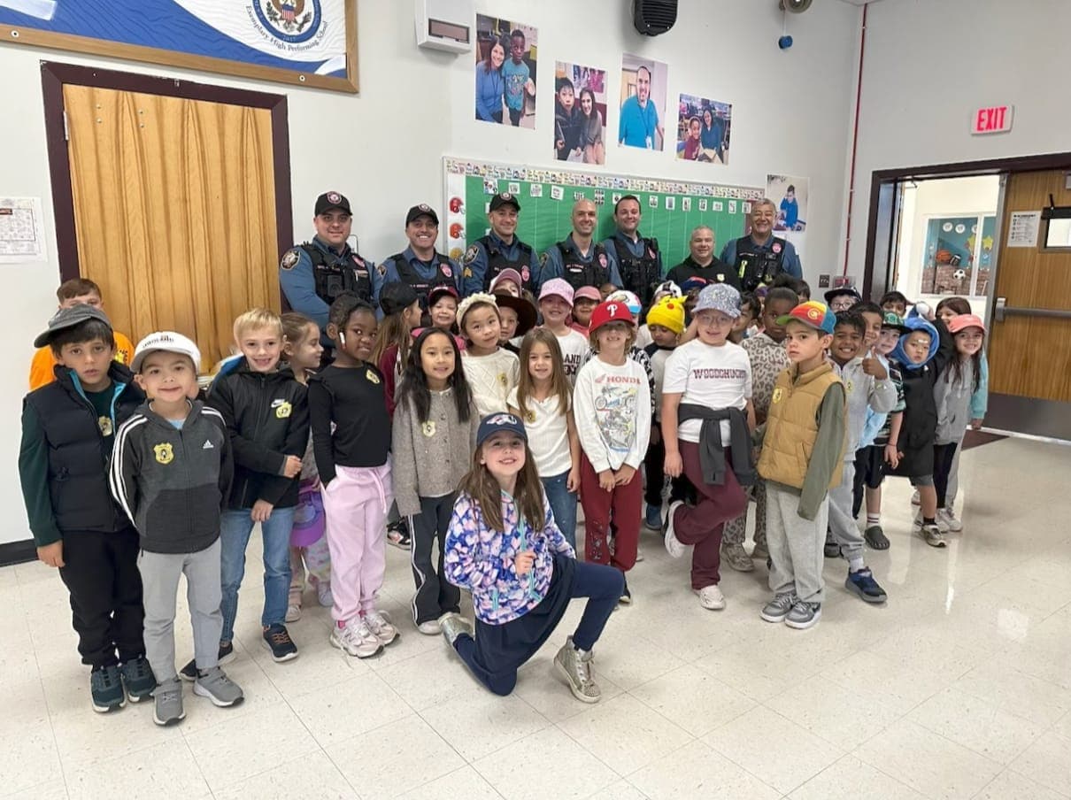 Mrs. Casorio’s first-grade class joins Warren Township police officers during Woodland School’s Color with a Cop event.